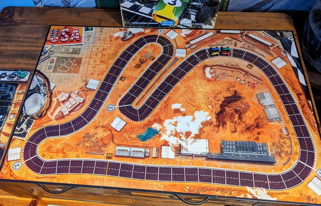 The USA track in Heat: Pedal to the Metal. Four cars are lined up on the starting grid.