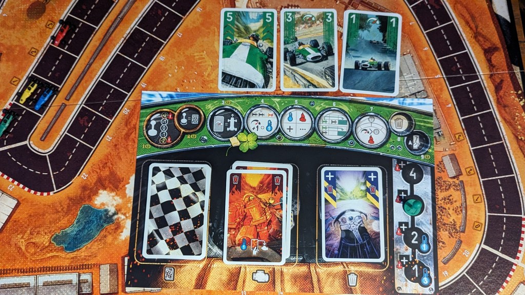 A typical player board featuring their draw deck, engine heat and discard pile. It shows a played hand of 9 total speed cards.